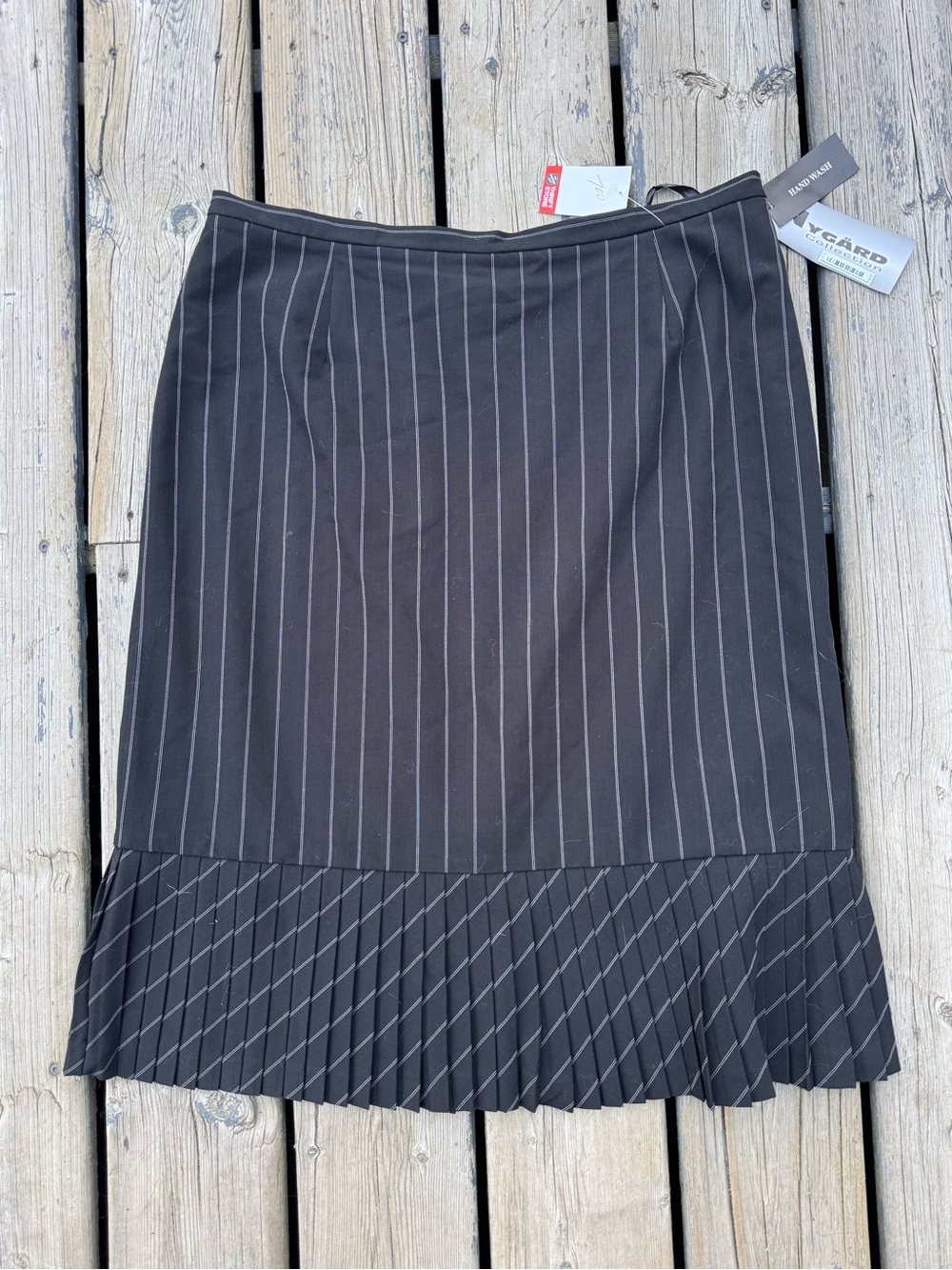Tailored Black Pinstripe Pencil Skirt with Pleated Hem